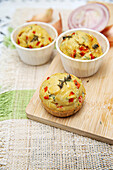 Spicy muffins with peppers, herbs, onions and sweet mustard