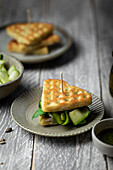 Waffle with courgette,goat's cheese and pesto sauce