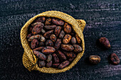 Cocoa beans in a hessian bag