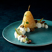 Poached pear with meringue cream