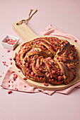 Pink praline and raspberry jam Babka