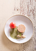 Foie gras with salt,roasted tomato,roasted hazelnuts and lovage