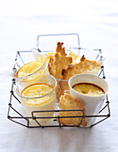 Baked egg custards with almond tuiles