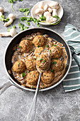 Veal meatballs with mushrooms, onion, garlic, parmesan, coriander, parsley and cream