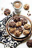 Duo of hazelnut cookies and all-chocolate cookies with Brazil nuts