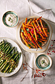 Carrot and green asparagus dips with parmesan cream