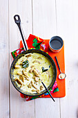 Add the coconut milk to the chicken and green curry mixture