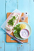Place the terrine on a sheet of greaseproof paper and place in a bain-marie.
