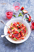 Verbena jelly with strawberries and strawberry syrup