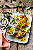 Grilled chicken and corn salsa with coriander and lime