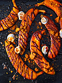 Bananas a la plancha with chocolate coulis, speculoos pieces and marshmallows