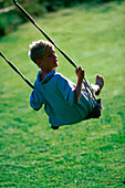 Boy on a swing