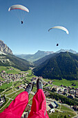 Paragliding over Corvara, near Corvara, Dolomites, Alta Badia South Tyrol. Italy