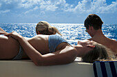 Sunbathing on boat, Caribbean Sea