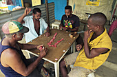 Four native men playing domino, St. Lucia, Caribbean
