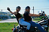 Couple on a Harley, on highway USA