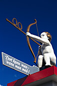 Cupid as signpost, Oktoberfest, Munich
