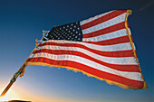 American Flag, Stars and Stripes against a blue sky, USA