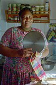 Woman in kitchen, Mother´s help, St. Lucia, Caribbean