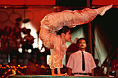 Acrobat at national circus, Saigon, Vietnam, Asia