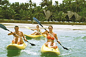 Rowing people, people kayaking