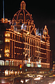 Lighting of the Harrods' fasade at night, Knightsbridge, Brompton Road, London, England, Great Britain