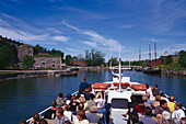 Passangers during the boat cruise to Soumenlinna, Helsinki, Finland