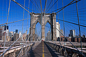 Brooklyn Bridge under blue sky, Manhattan, New York, USA, America