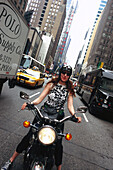 7th Ave motorbike chick, Manhattan, New York, USA