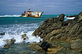 Shipwreck in front of coast, Cape Algulhas, West Cape, South Africa