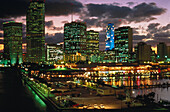 Skyline under clouded sky at night, Miami, Florida USA, America