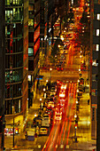 Cars on a street downtown in the evening, Business District, 17th Street, Philadelphia, Pennsylvania, USA, America