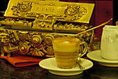 Coffee Macchiato on a table at Cafe San Marco, Triest, Friuli, Italy, Europe