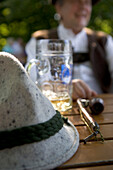 Old man with hat and pipe in beergarden, Bavaria, Germany
