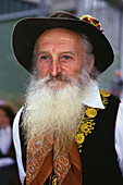 Man with beard wearing traditional costume, Wine festival, Lugano, Ticino, Switzerland, Europe