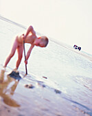 Schaufeln am Nordstrand, Ruhezone, Naked boy playing on the beach, Spiekeroog Island, East Frisian Islands, Lower Saxony, Germany