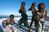 Children playing on the beach, fishing village Maternwe, Zanzibar, Tanzania, Africa