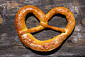 Pretzel on table, beergarden, Munich, Bavaria, Germany