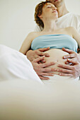 Pregnant Girl, Pregnant Girl, Pregnant women holding her belly, Pregnancy Wellness Home
