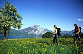 Two young hikers at Traunsee Lake, Traunstein Mountain, Salzkammergut, Austria