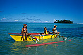 Flower Children on Canoe, Muri Beach, Rarotonga Cook Islands