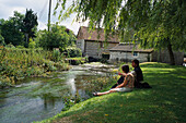 Relaxing by the creek, Godmanstone, Dorset, England