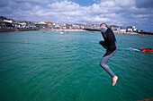 Jumping into St Ives Harbour, St Ives, Cornwall, England