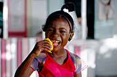 Girl with Mango, Port Elizabeth, Bequia St. Vincent & The Grenadines