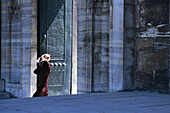 Woman at Sultan Ahmet Cami, Blue Mosque Istanbul, Turkey
