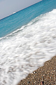 Pebbled beach, Aegean Sea Wave, Rhodes Main Beach Rhodes, Greece