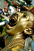 Golden painted man at carnival, Baranquilla, Colombia, South America
