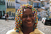 Hairdresser Oliver with pearl braids, Salvador de Bahia Brazil