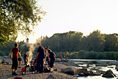People, barbecueing and picnicing at Isar River, Sendling, Munich, Bavaria, Germany