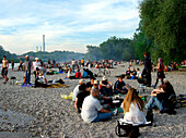 People, barbecueing and picnicing at Isar River, Sendling, Munich, Bavaria, Germany